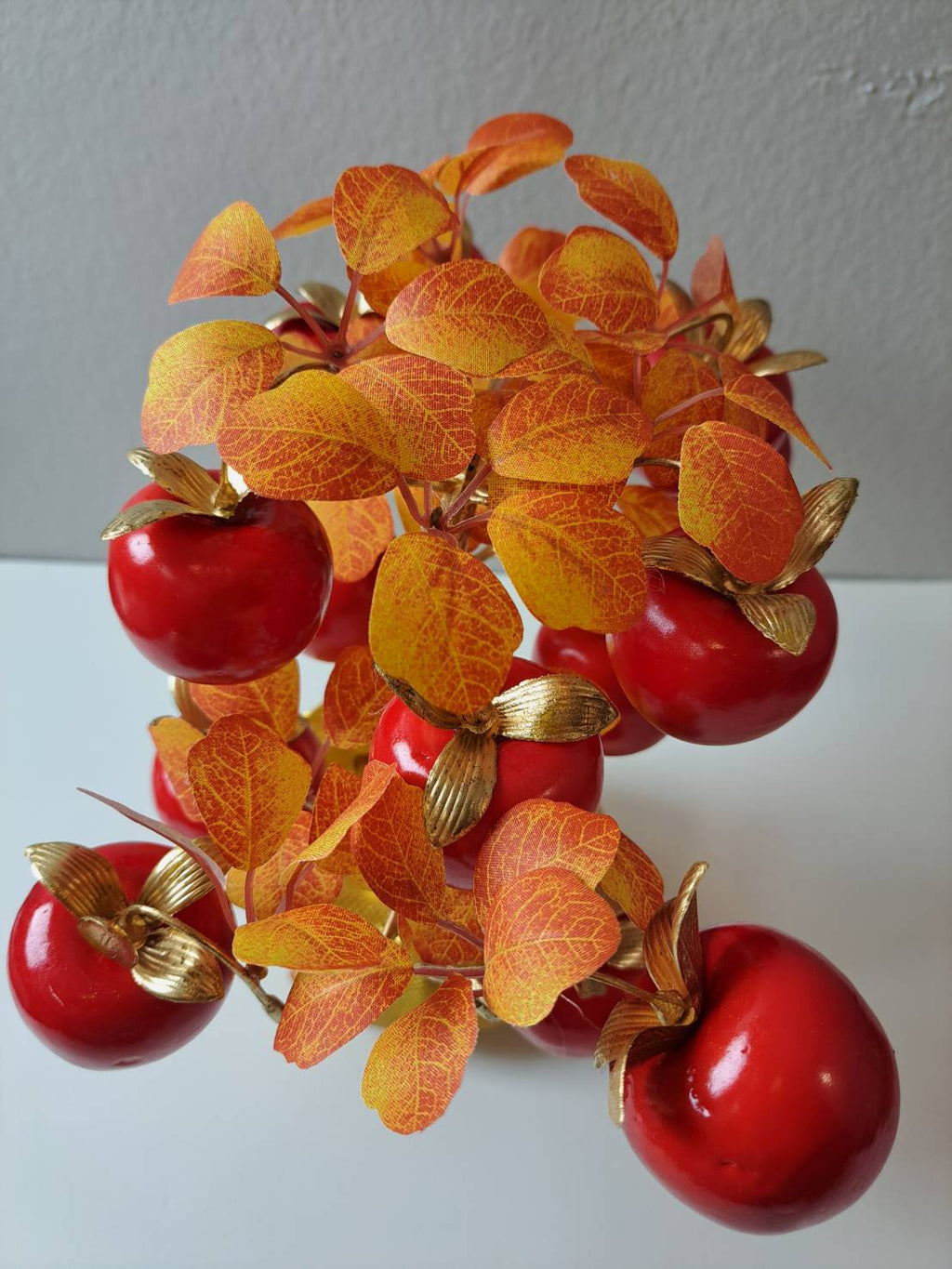 Decorative golden ornamental pot with red embossed floral and blossom accents on Artificial Apple Tree N20