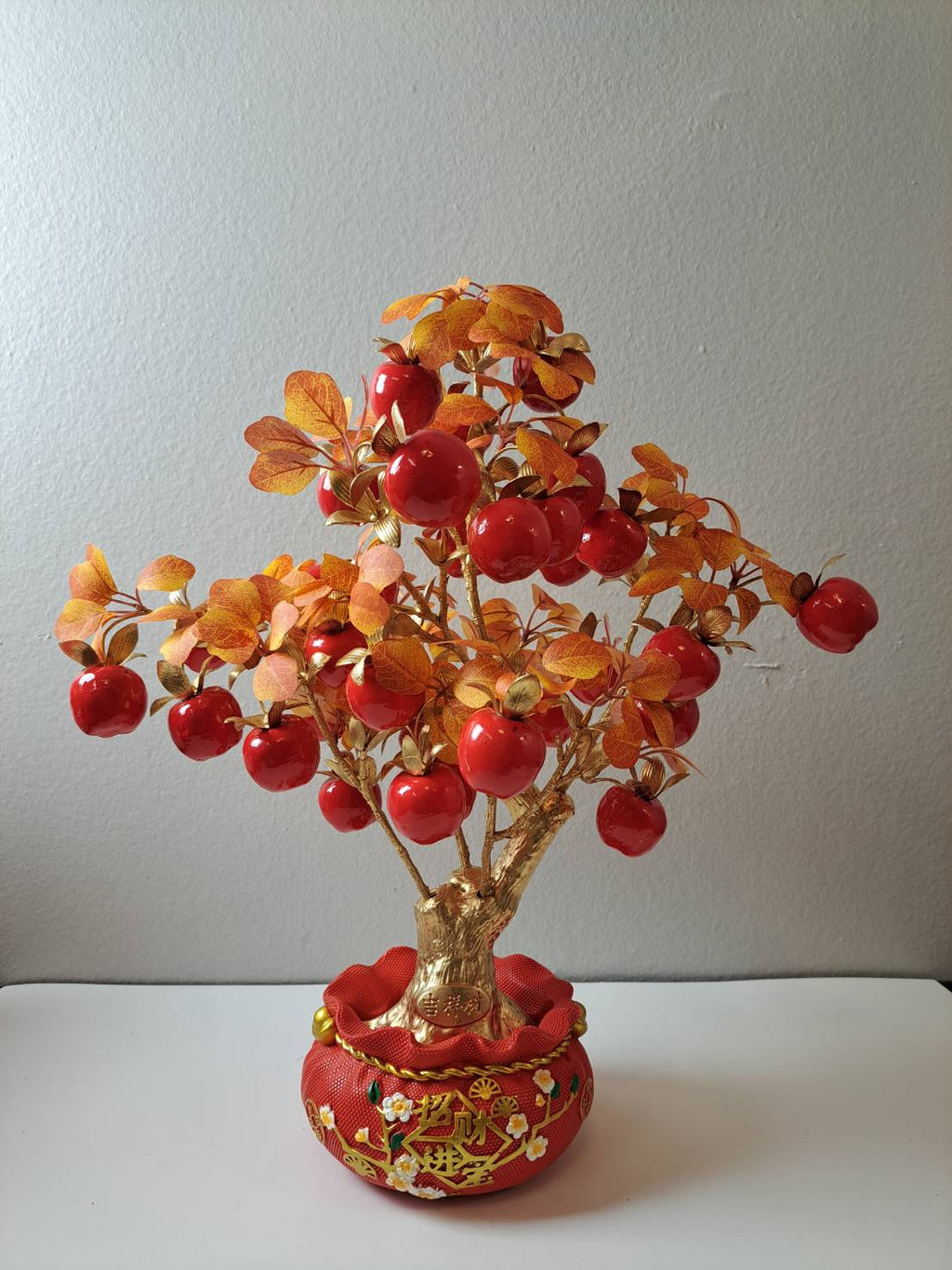 Full view of Artificial Red Apple Tree N27 showing abundant glossy red faux apples on golden branches with amber autumn leaves