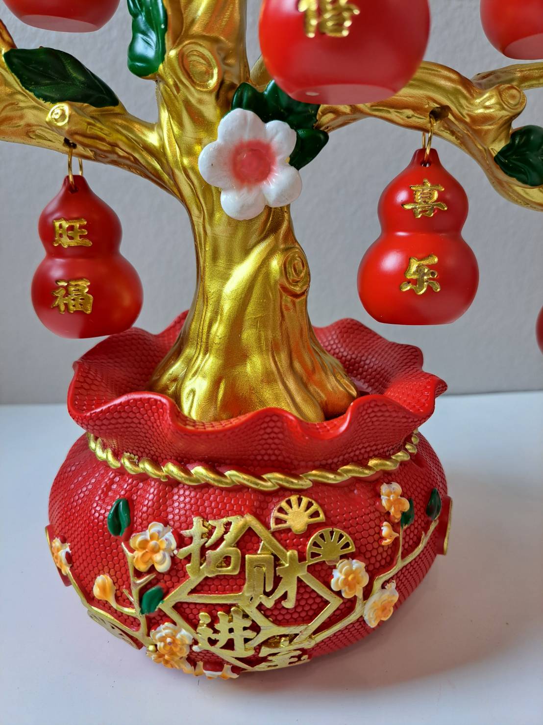 Close-up of red gourd ornaments with gold Chinese characters on Feng Shui Lucky Gourd Tree CX616