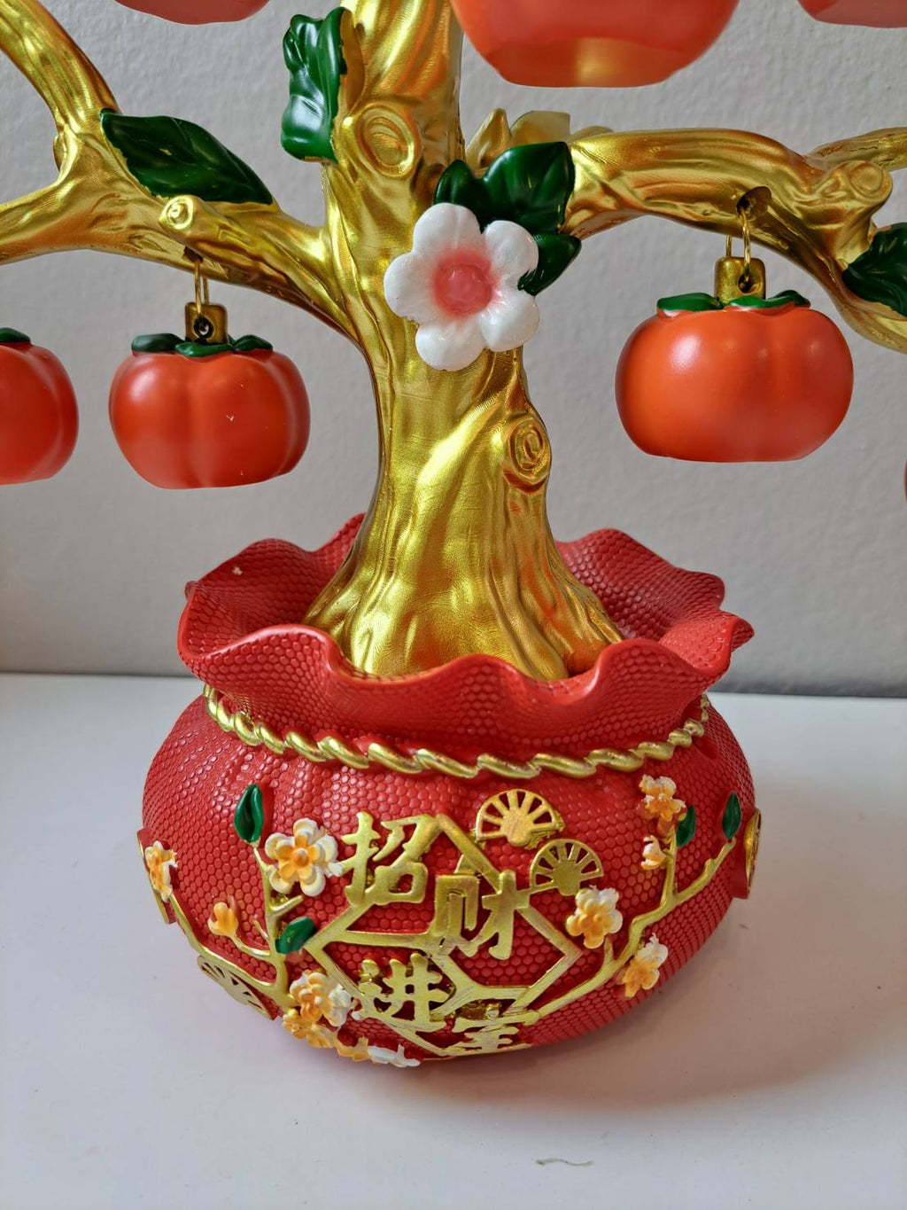 Full view of CX618 Decorative Red Persimmon Tabletop Tree with white blossoms and green leaves