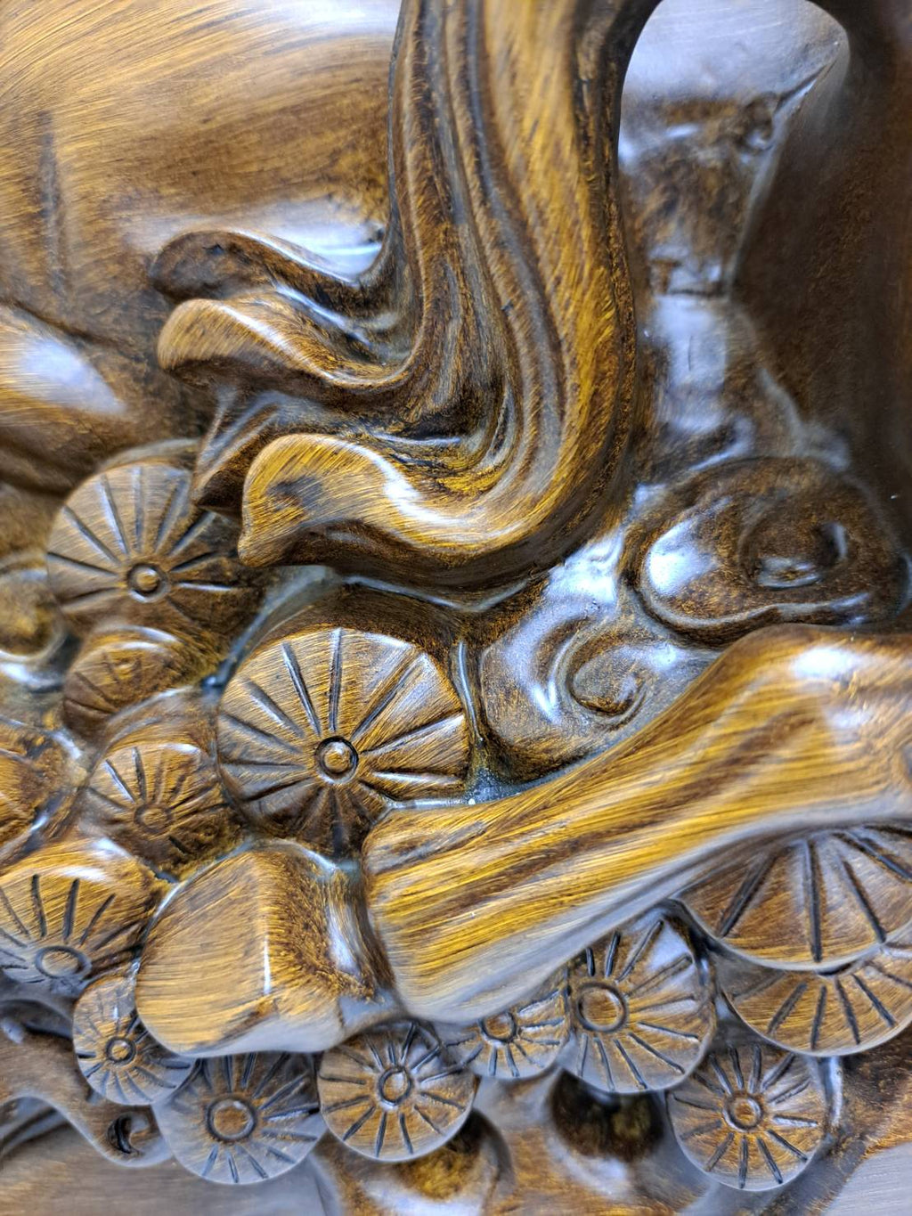 Side profile of dual horse statue 6944-1 showing full composition with coin cluster base and victory orb