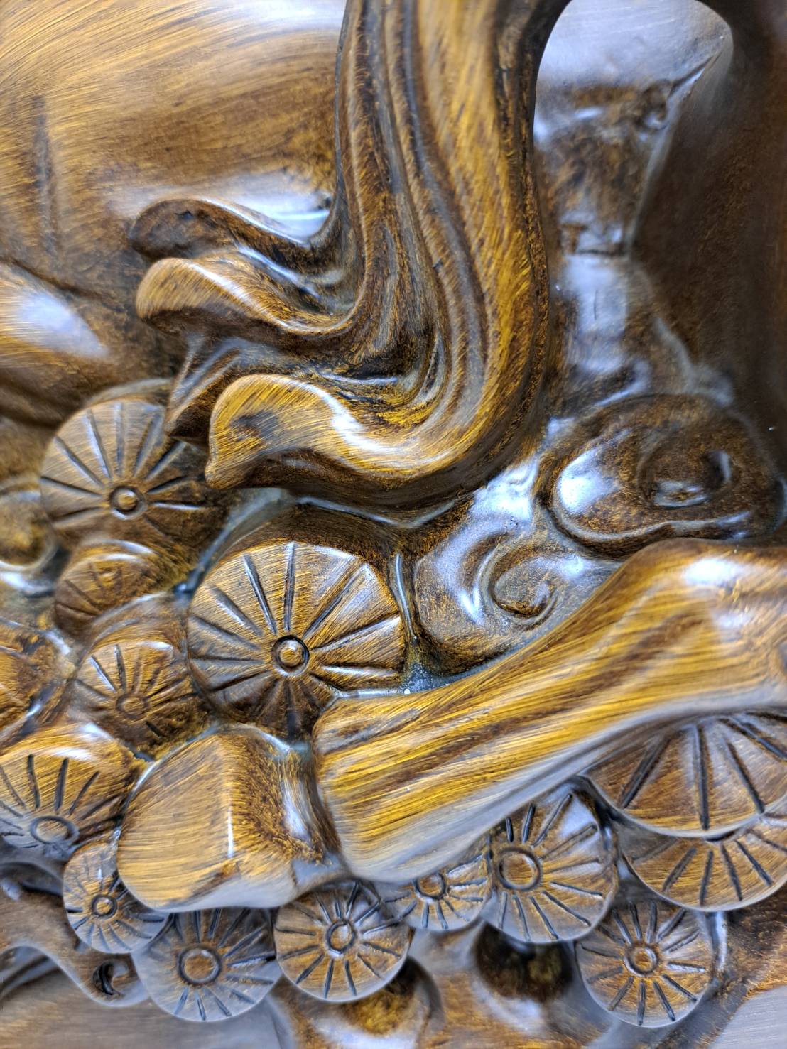 Side profile of dual horse statue 6944-1 showing full composition with coin cluster base and victory orb
