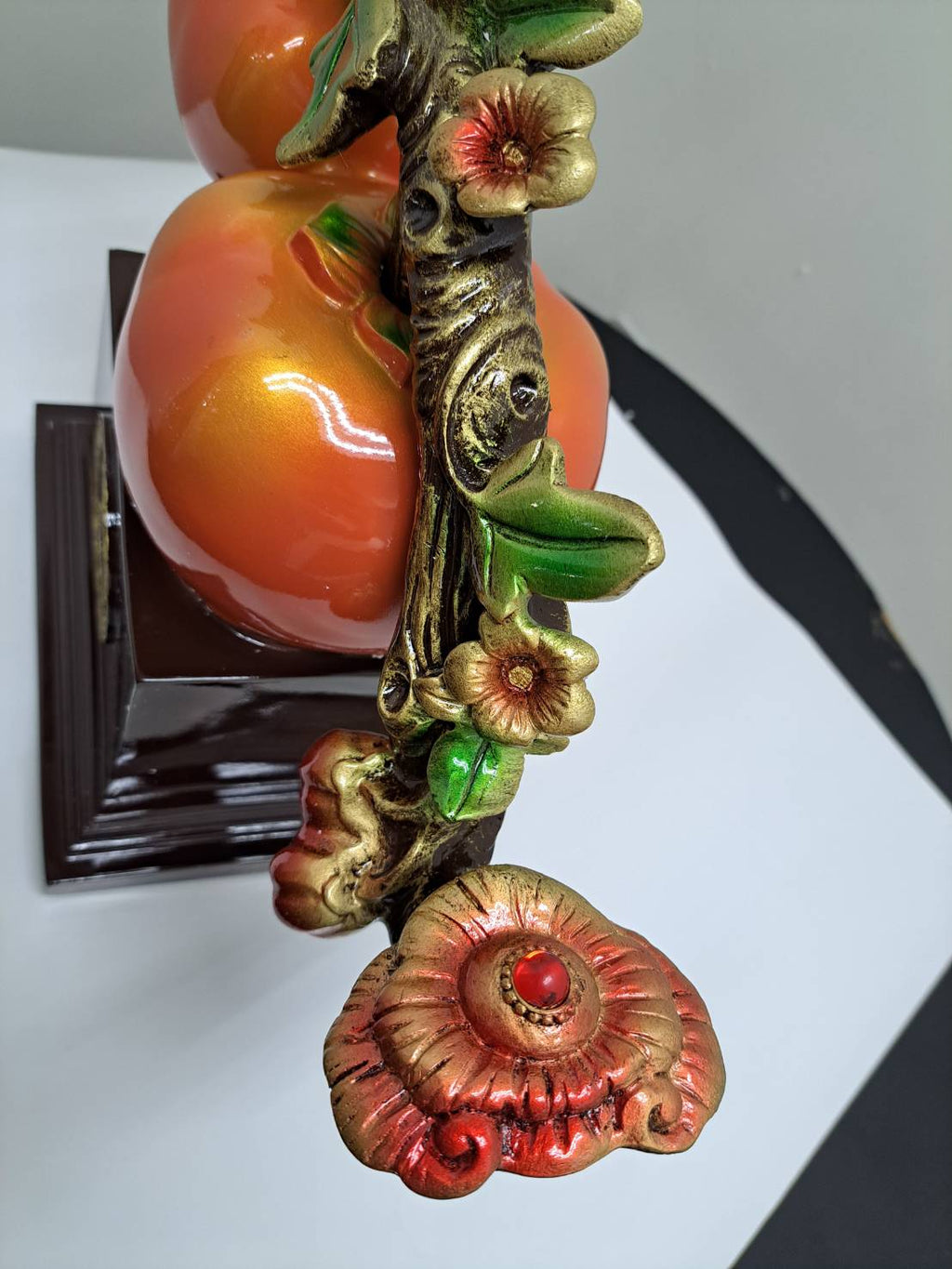 Base detail of ML-363 showing dark mahogany base with gold 万事如意 medallion inscription