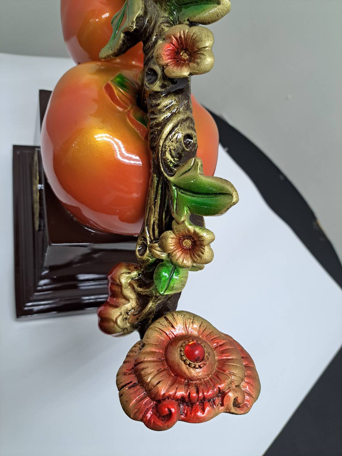 Base detail of ML-363 showing dark mahogany base with gold 万事如意 medallion inscription