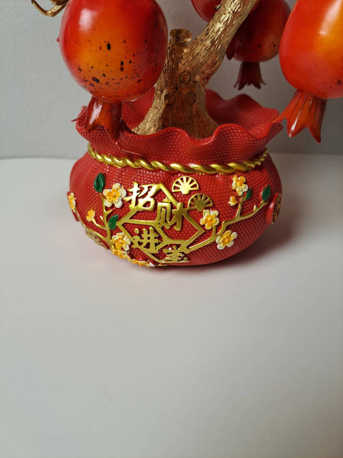 Artificial Red Pomegranate Tree N17 on hotel reception counter – luxury home and office decor