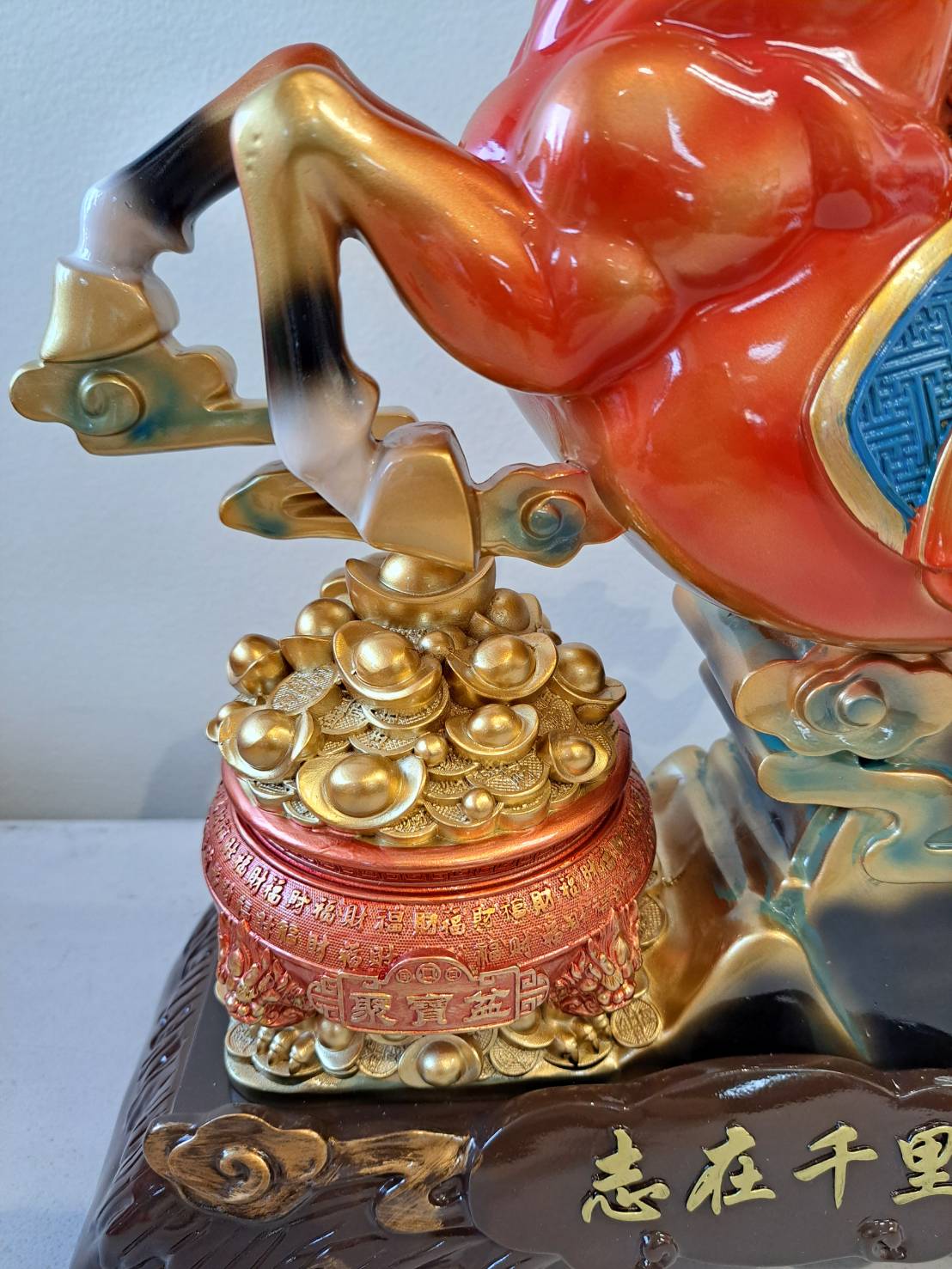 Close-up of rearing horse head and flowing mane with gold highlights on statue 7358-1