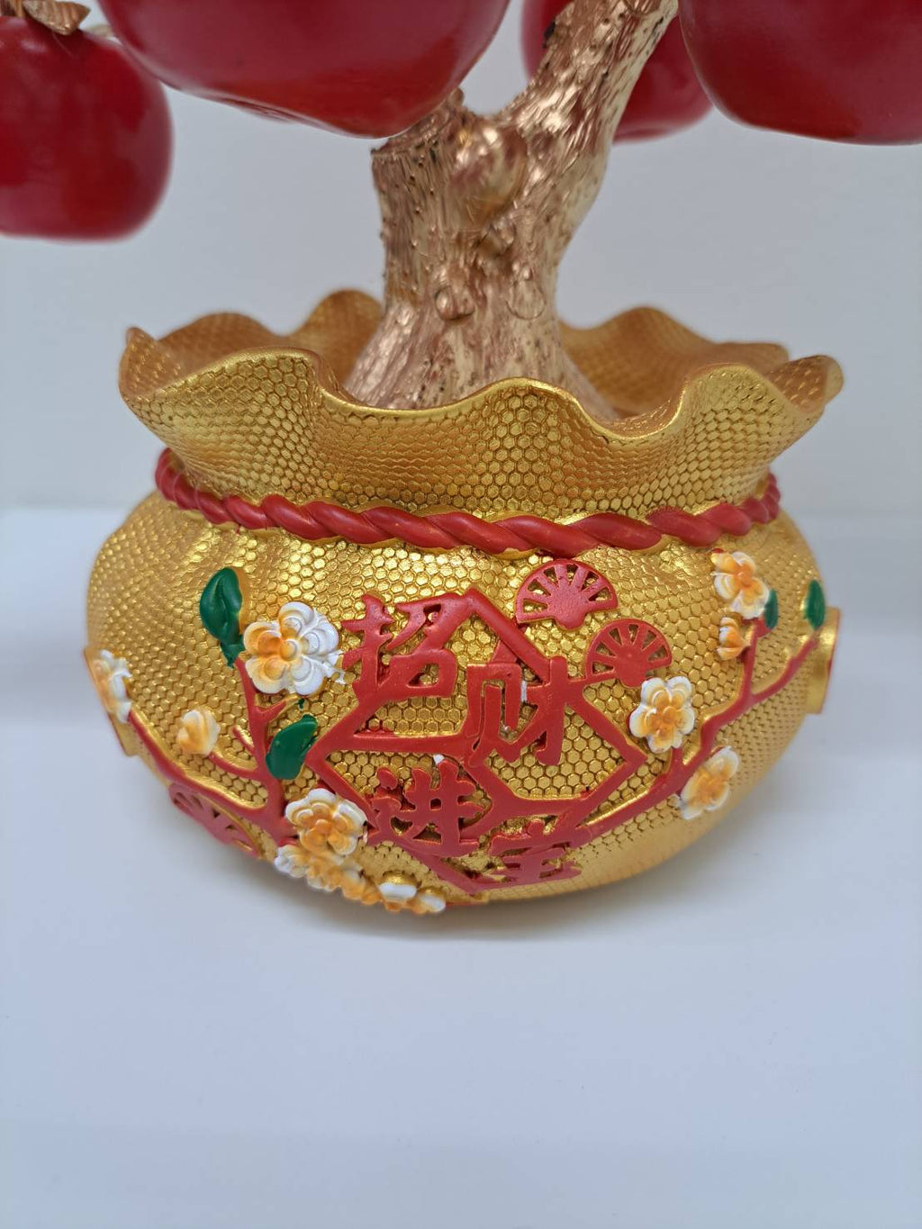 Bottom view of golden pot showing craftsmanship detail on Artificial Apple Tree N20
