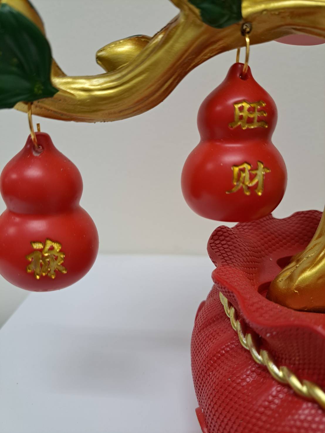 Detail of gold tree trunk and red gourd ornaments on Feng Shui Lucky Gourd Tree CX616