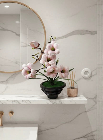 FT-257-B faux blush pink magnolia arrangement displayed on bathroom vanity counter