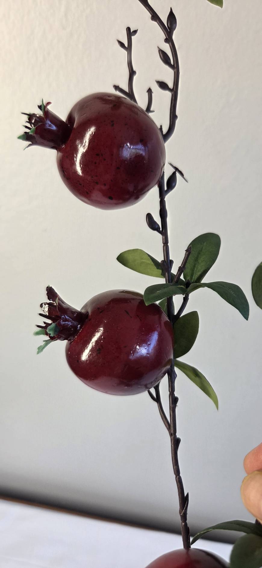 Faux pomegranate branch detail