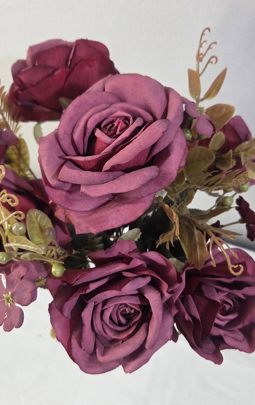 Close-up of faux golden leaves and green berry stems detail - ROB-02