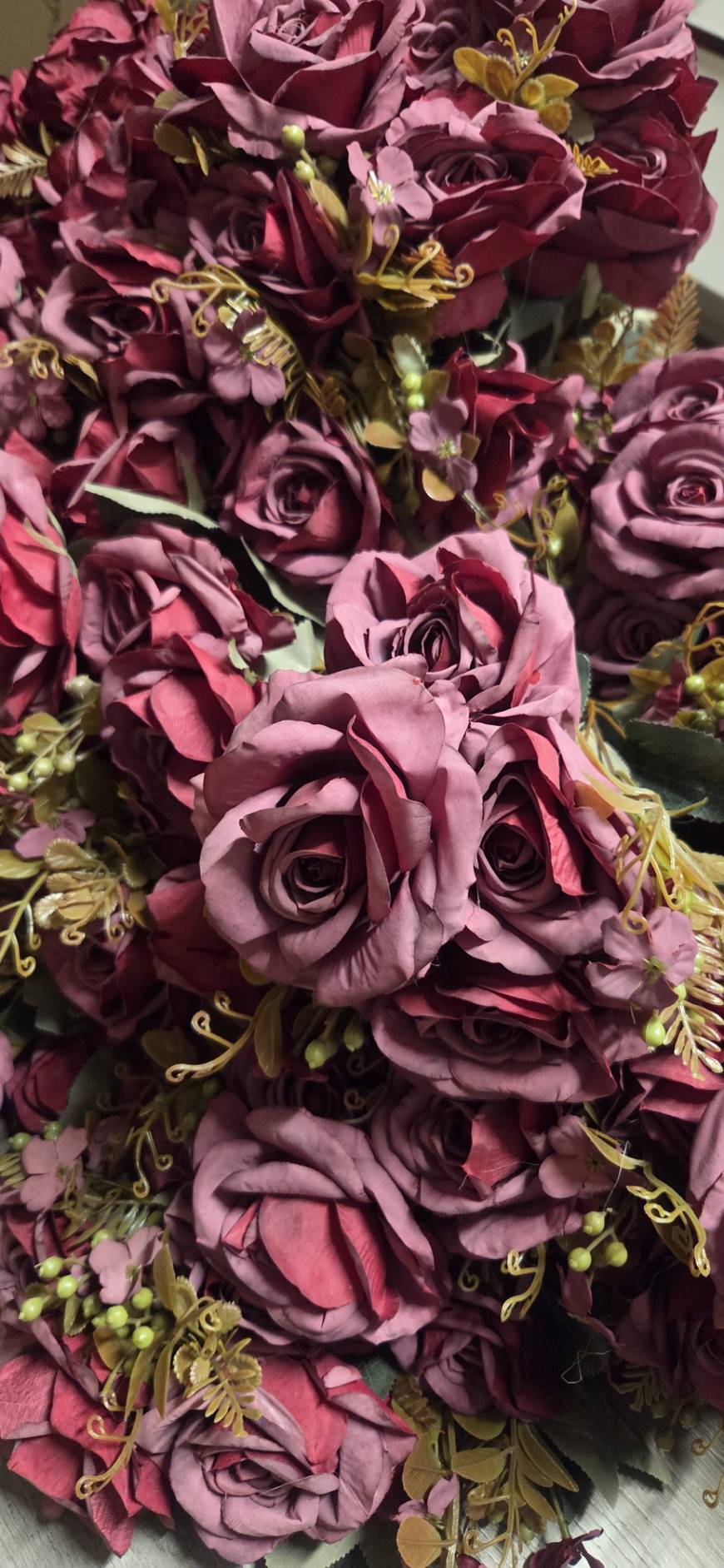Multiple faux burgundy rose bouquets ROB-02 grouped together showing full volume