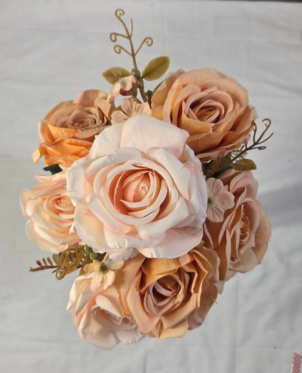 Faux peach rose bouquet ROB-01 in white ribbed vase on living room coffee table - lifestyle decor