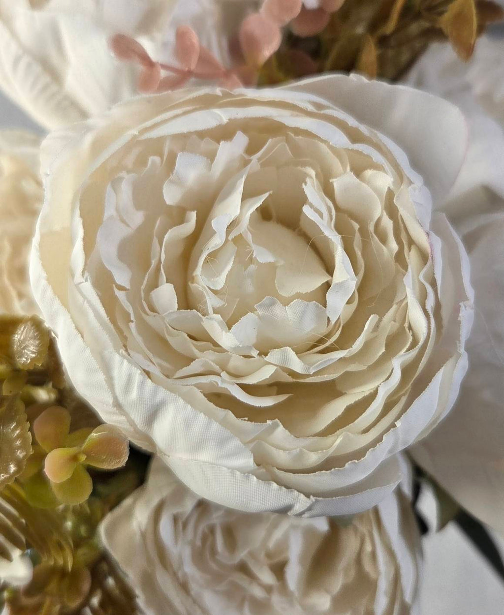 Faux Peony Rose Bouquet ROS-05 close-up - layered white and cream peony petals with spiral center