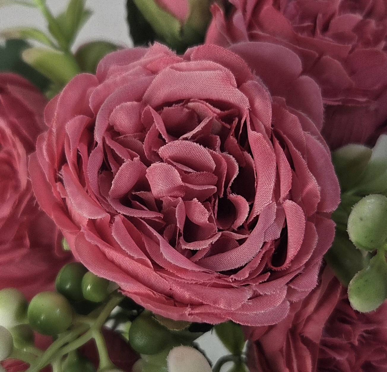 Faux Peony Rose Bouquet ROV-03 close-up - layered mauve peony petals with multiple buds and dark green serrated leaves
