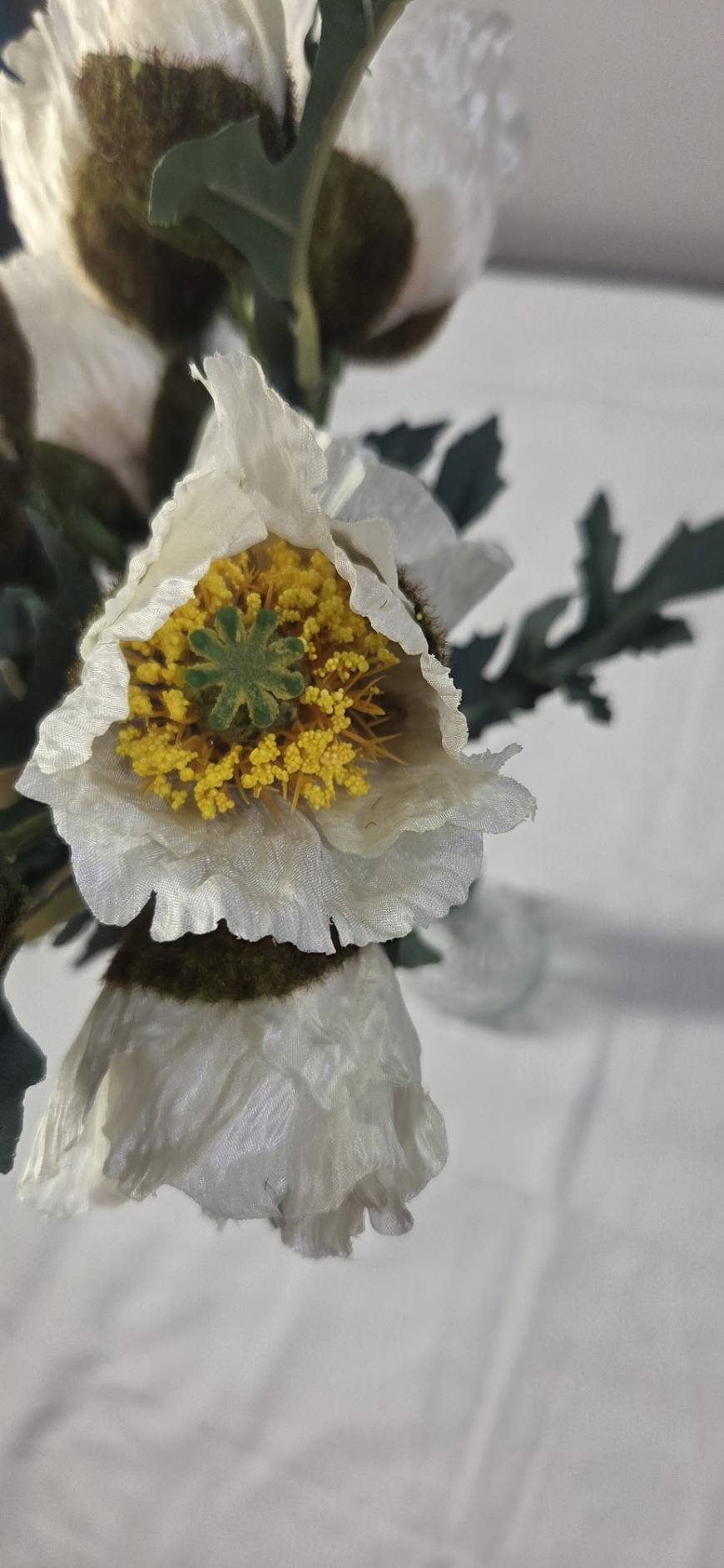 Faux White Poppy Bouquet PP-02 - full bouquet laid flat showing white poppy stems and foliage