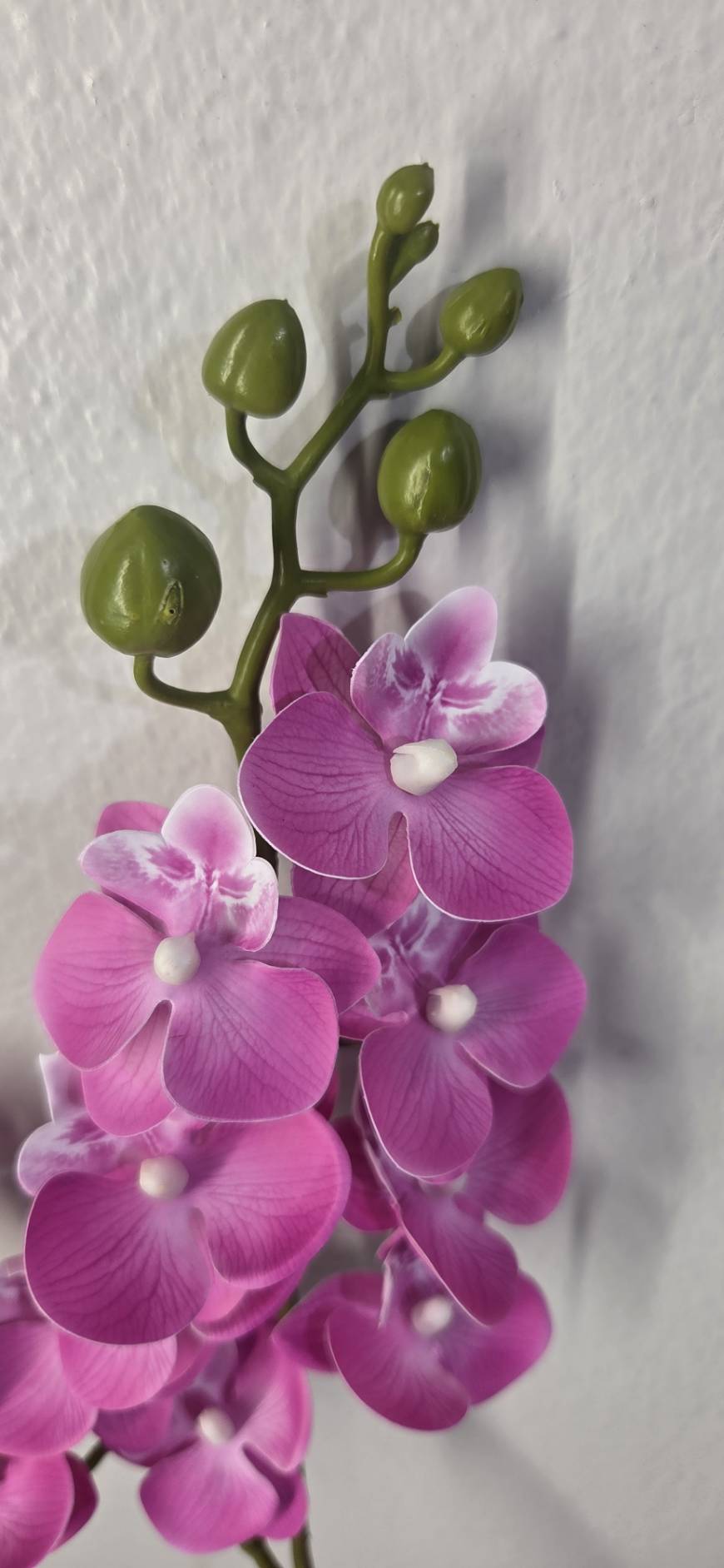 Faux Purple Phalaenopsis Orchid Stem OCT-04 - close-up of magenta purple orchid blooms with white centers