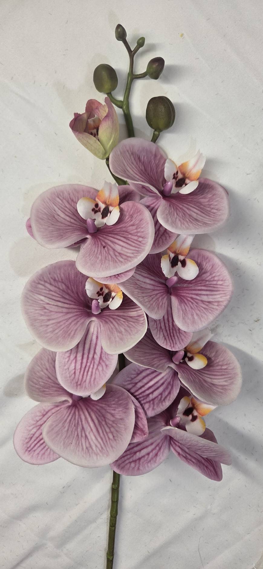 Faux Mauve Phalaenopsis Orchid Stem ORE-02 - close-up of dusty purple orchid bloom with white and gold center